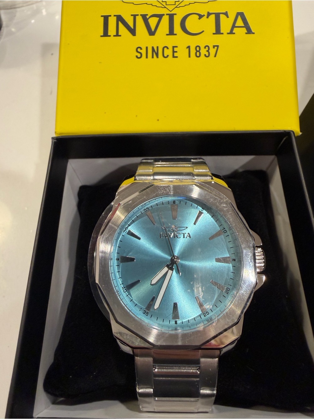 Invicta Steel Watch with Teal Sunburst Dial